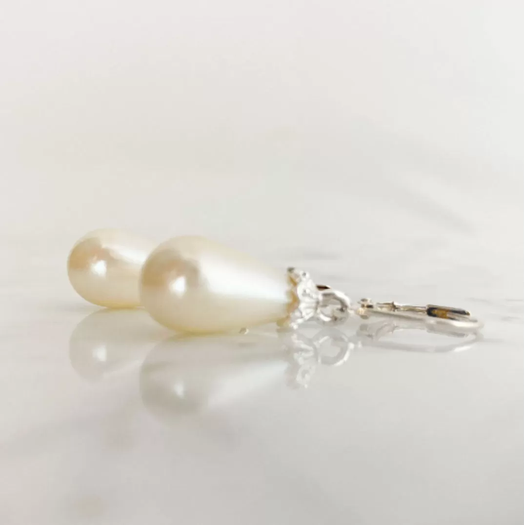 WOODS opalescent tear drop pearl earrings